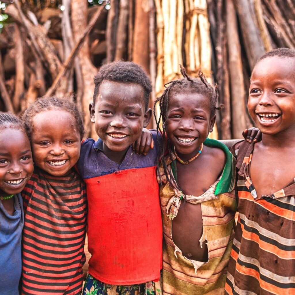 alt= "Young African Children Playing, Smiling and Having Fun"